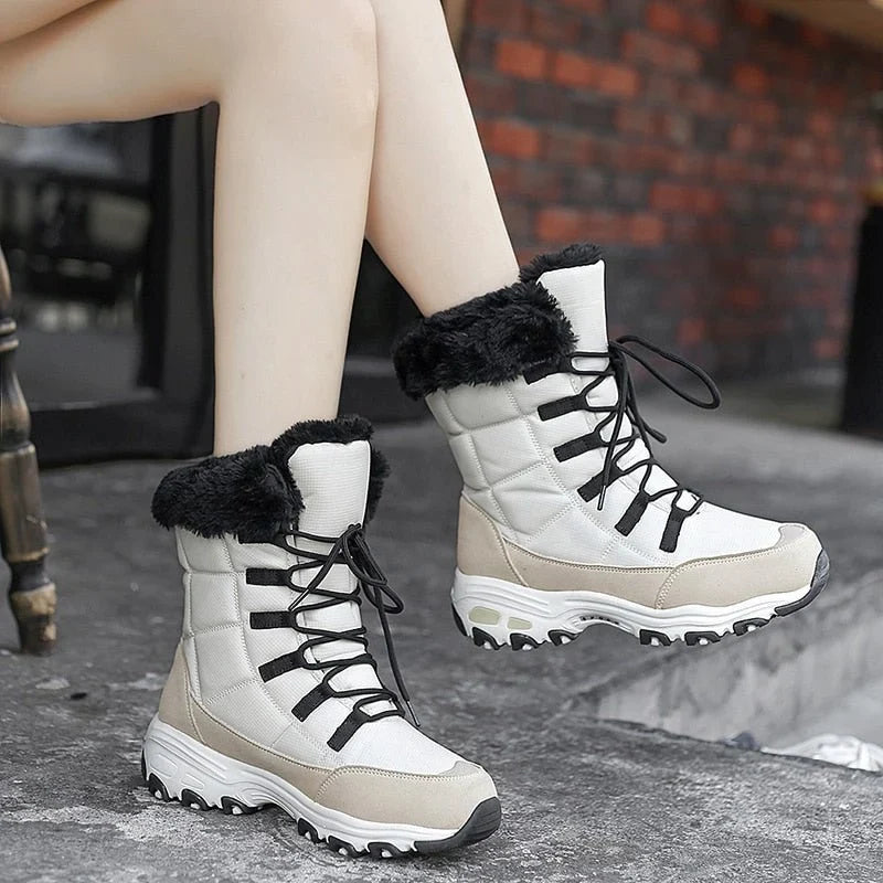 Woman wearing HexoComfy™ Women's Orthopedic Winter Boots in Beige on a stone step